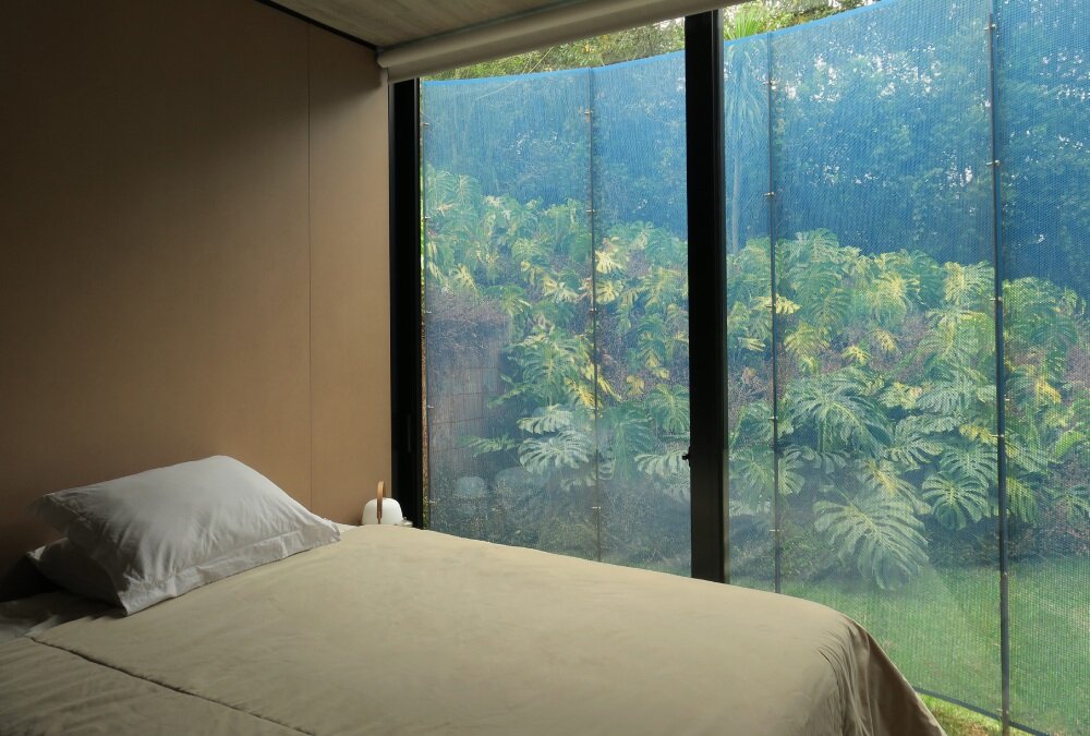 paul clemence captures perforated steel curves of rodrigo ohtake's modular house in brazil