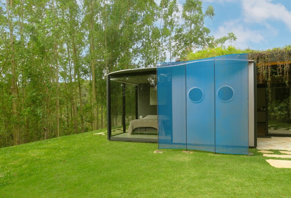 paul clemence captures perforated steel curves of rodrigo ohtake's modular house in brazil