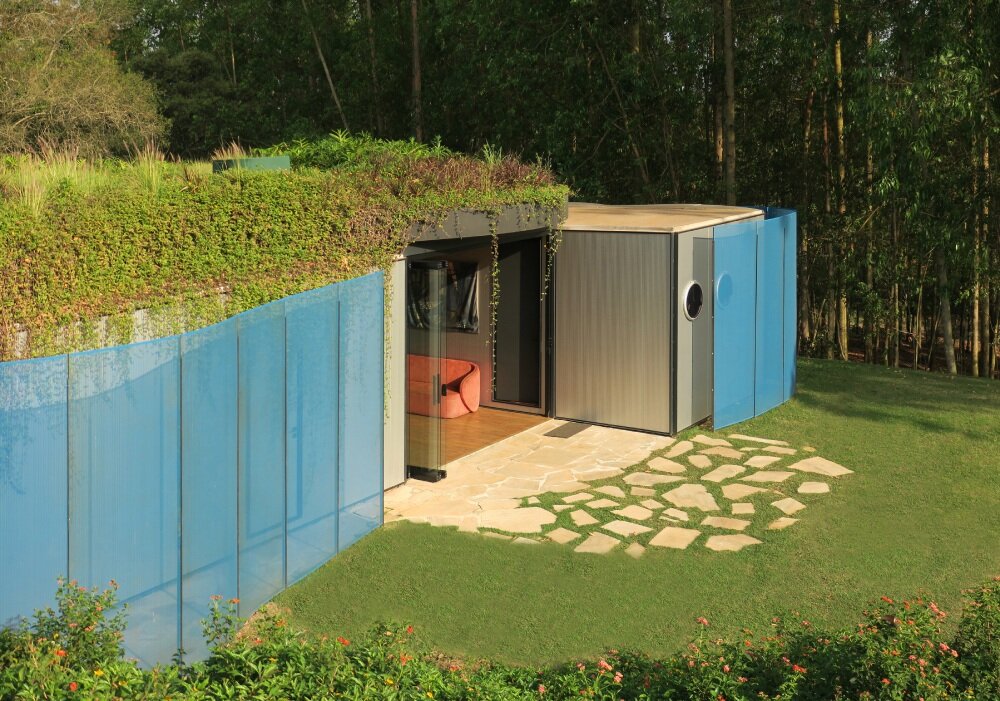 paul clemence captures perforated steel curves of rodrigo ohtake's modular house in brazil