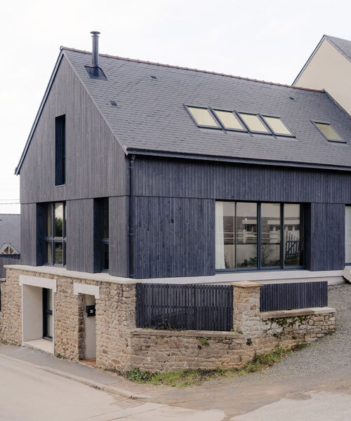 dark wooden slats coat house in saint-malo by maab architectes, sitting on stone plinth