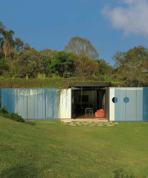 paul clemence captures perforated steel curves of rodrigo ohtake's modular house in brazil