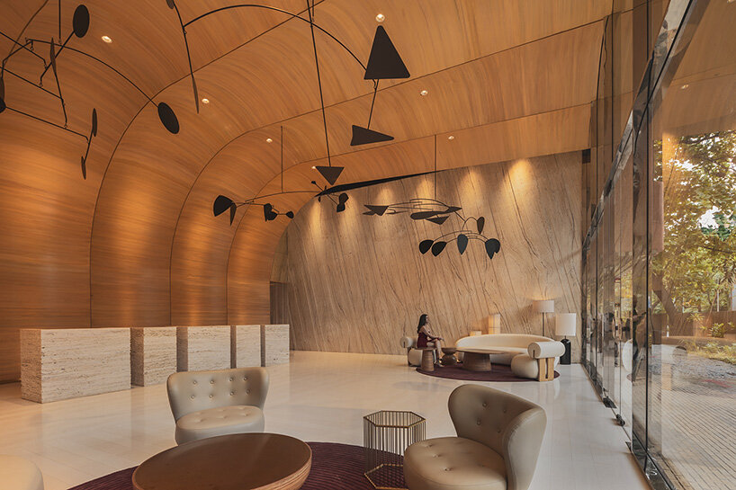 pink tower by satguru builders and NUDES brings sculptural curves to mumbai's skyline