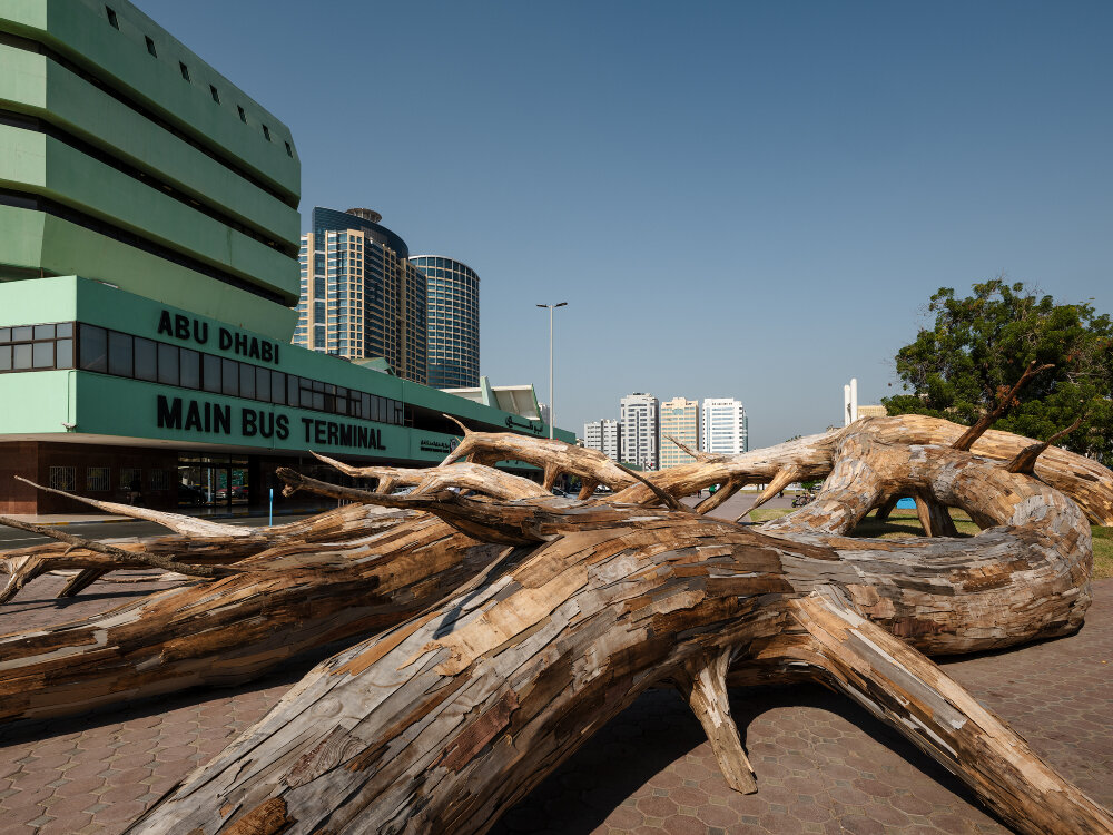 daniel buren's stripes & zainab alhashemi's concrete sculptures frame abu dhabi bus terminal