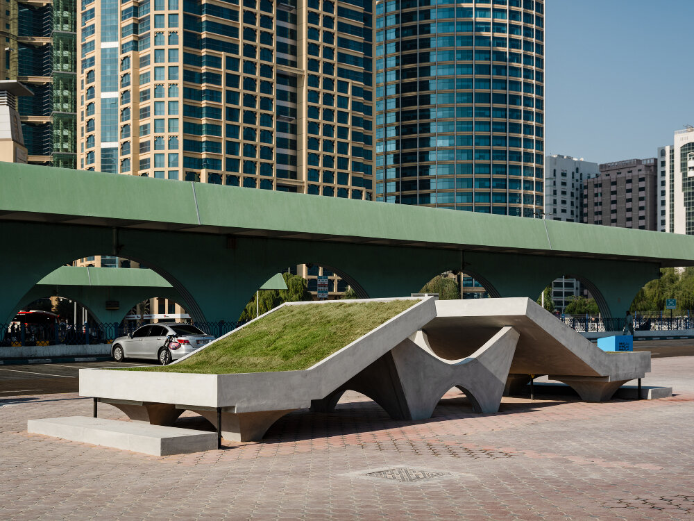 daniel buren's stripes & zainab alhashemi's concrete sculptures frame abu dhabi bus terminal