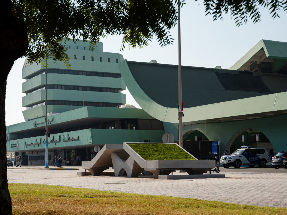 daniel buren's stripes & zainab alhashemi's concrete sculptures frame abu dhabi bus terminal