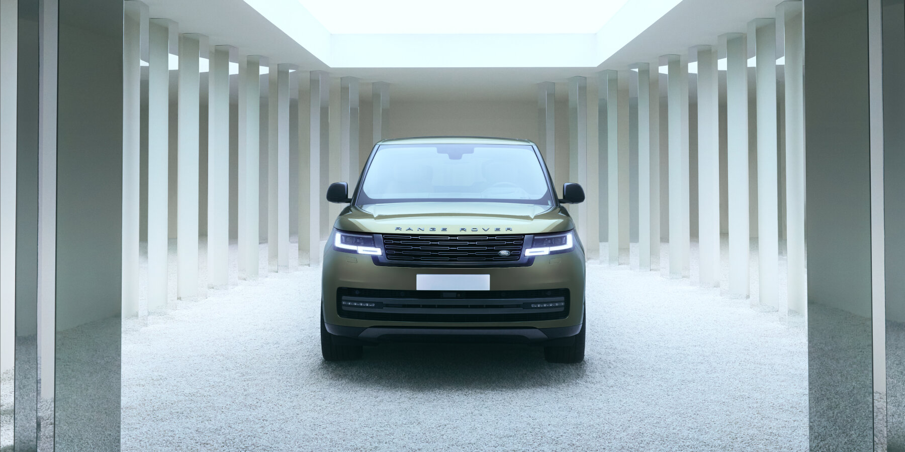 range-rover-installation-travel-time-1970s-car-dealership-futuristic-2025-nuova-interview-designboom-ban