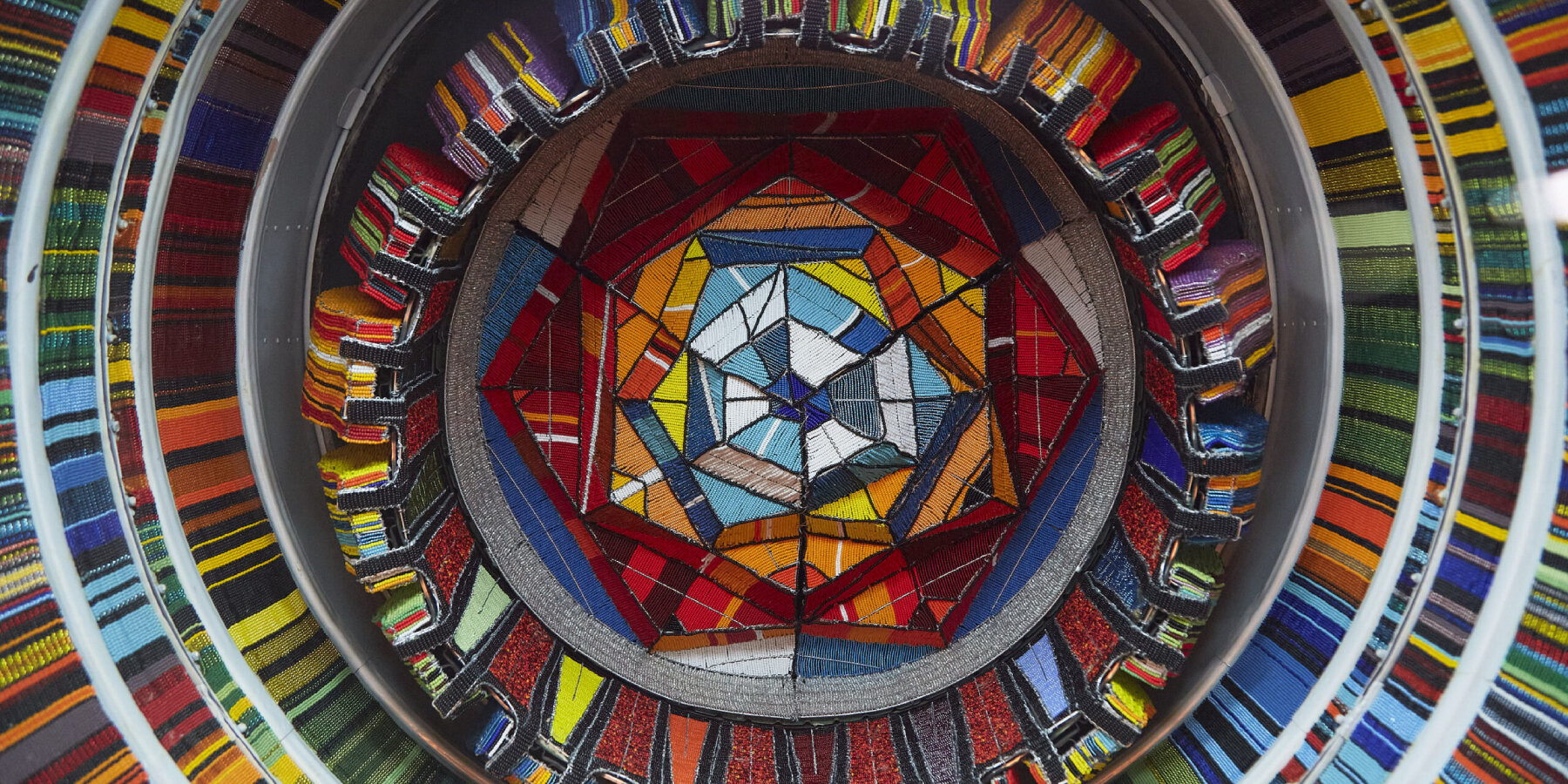 reclaimed-mig-21-fighter-jet-colorful-glass-beads-ralph-ziman-designboom-ban2