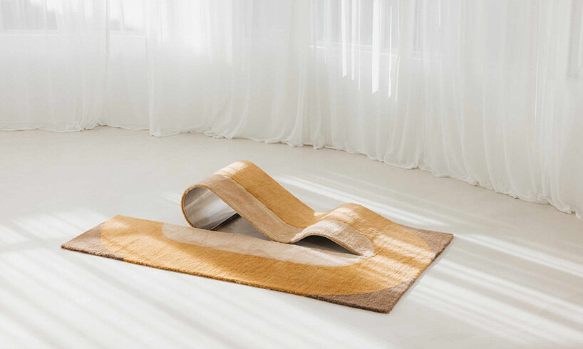 sculptural daybed emerges from gun-tufted wool rug by BUDDE and nando studio
