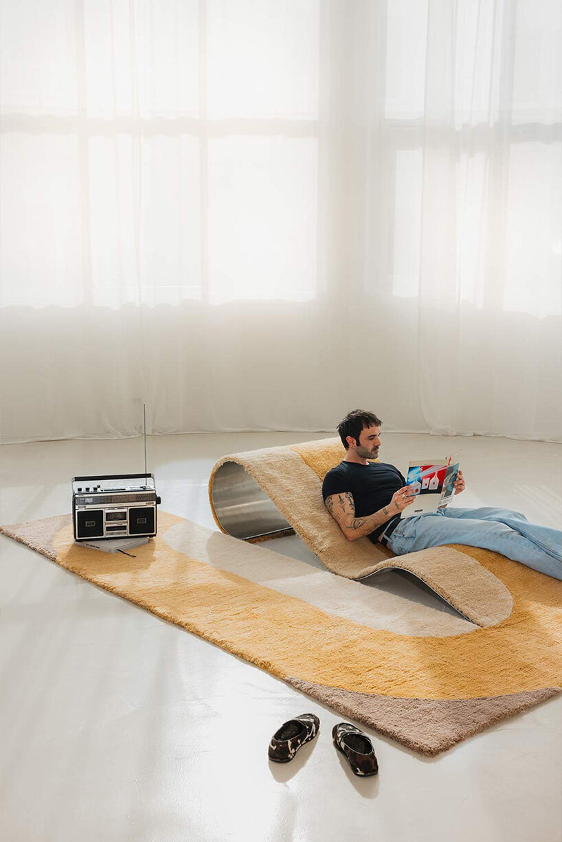 sculptural daybed emerges from gun-tufted wool rug by BUDDE and nando studio