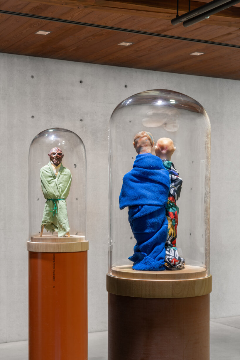 A room at Thomas Schütte's exhibition featuring a collection of sculptures and drawings depicting human tension.