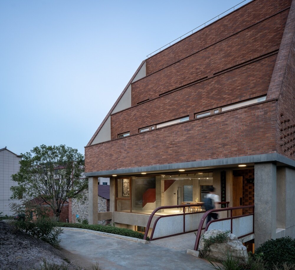 stepped brick layers of MUFU archlab's cultural space hosts village's festival traditions in china