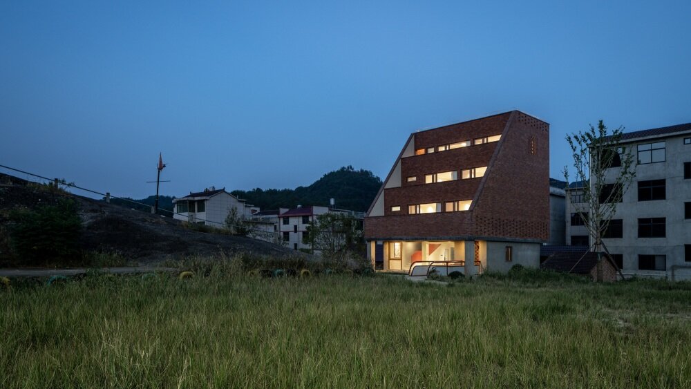 stepped brick layers of MUFU archlab's cultural space hosts festival traditions in china village
