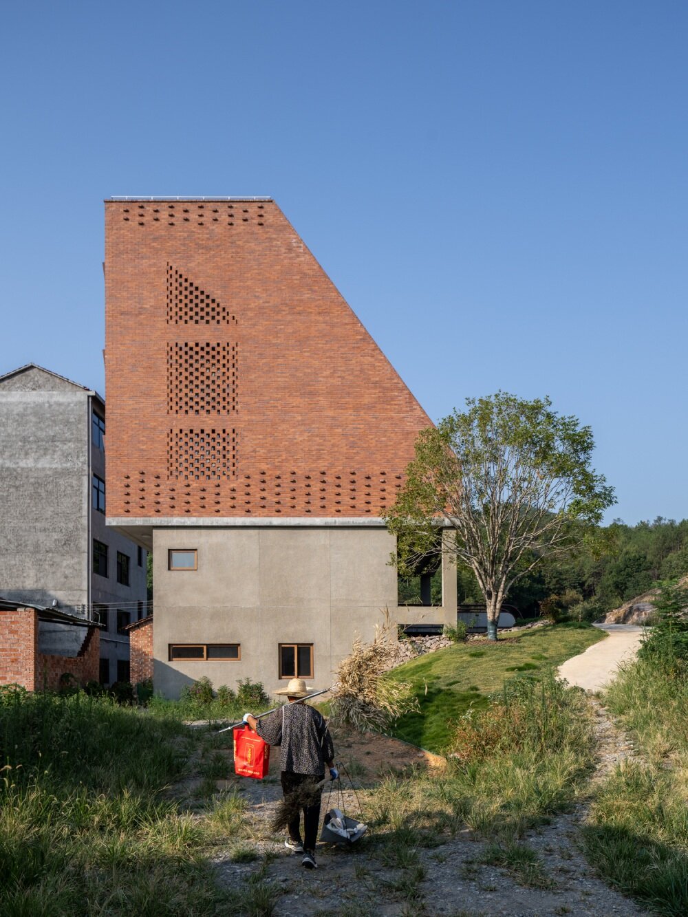 stepped brick layers of MUFU archlab's cultural space hosts village's festival traditions in china