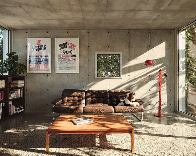 alexandre bernier architecte designs concrete residence within a garden in montreal