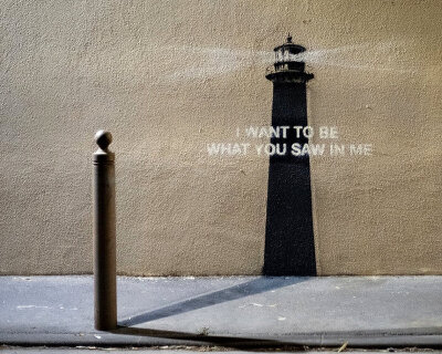 banksy returns with a sentimental lighthouse mural in an 'unknown' location