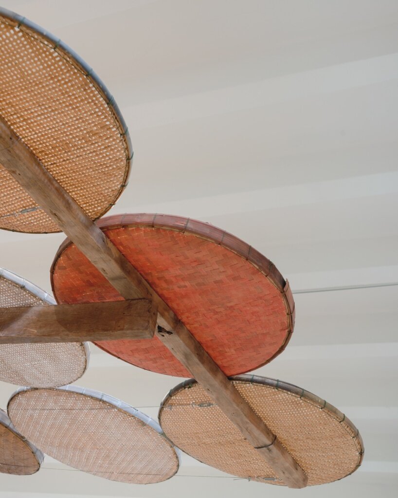 boonserm premthada upcycles thai rice barns for elephant food shelter at triennale milano