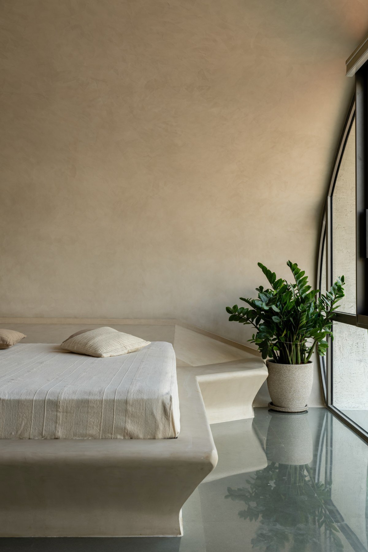 carapace house by achyutam designs carves into tubular concrete volumes in india