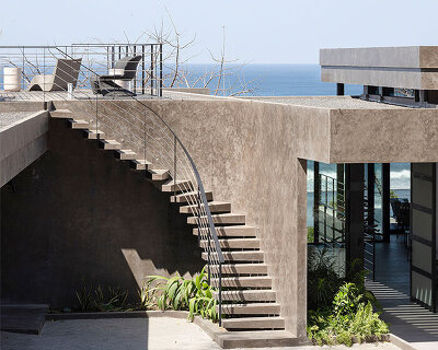 LSD architects gently hangs concrete casa vid e higurea over cliff in costa rica