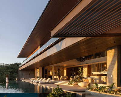 cantilevered planes of QBO3 arquitectos' casa yume frame tropical views in costa rica