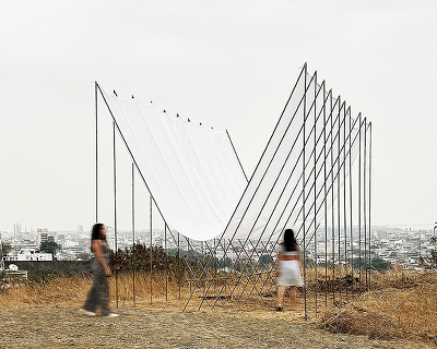 translucent fabric binds horizon pavilion's arrayed metal frame atop of ecuador hillside