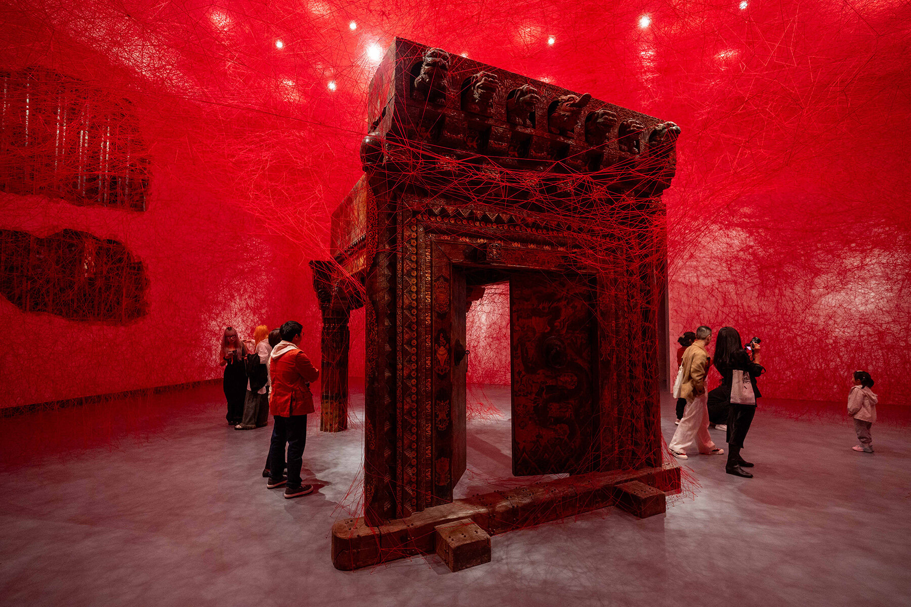 chiharu-shiota-butterfly-wings-warm-beds-beijing-red-brick-art-museum-designboom-large03