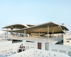 christian kerez eliminates ramps in bahrain car parks with sloping concrete geometries