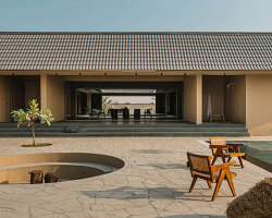 sculpted shell of stone and plaster encircles courtyard house by d’well in india