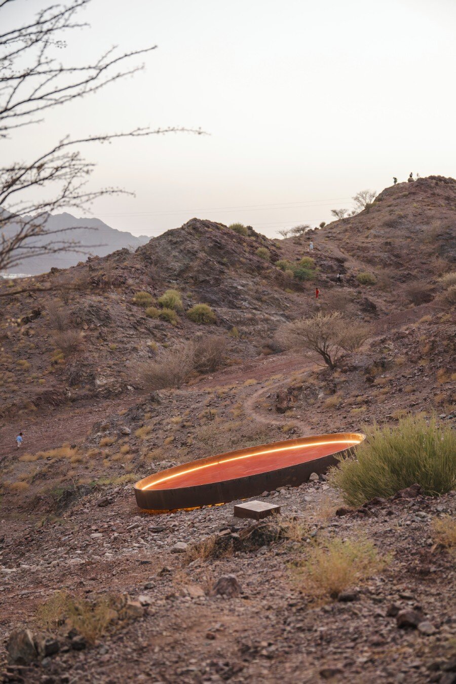 five metallic discs carve shaikha al mazrou's contemplative sculpture trail in UAE mountains