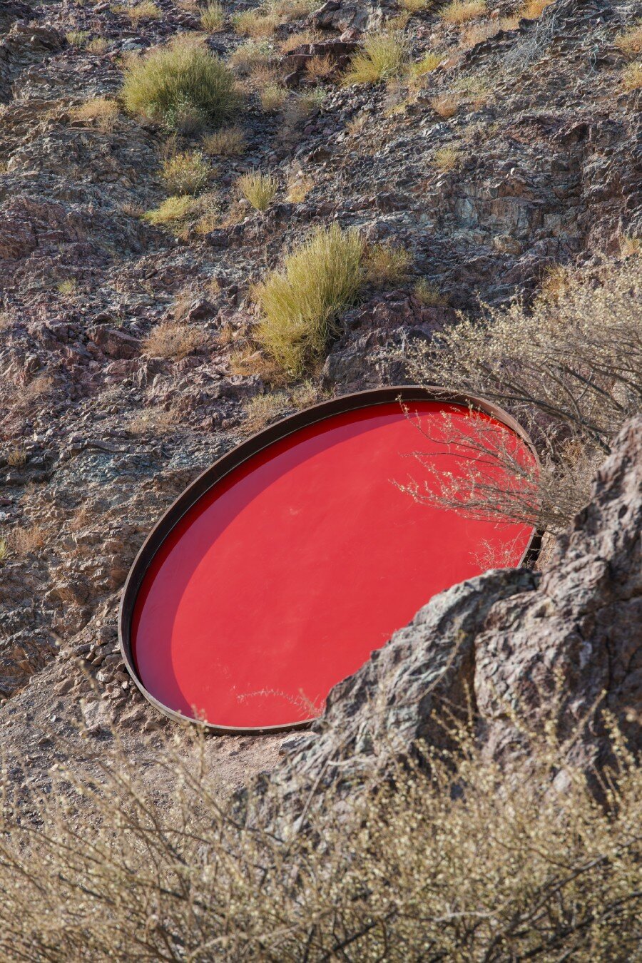 five metallic discs carve shaikha al mazrou's contemplative sculpture trail in UAE mountains