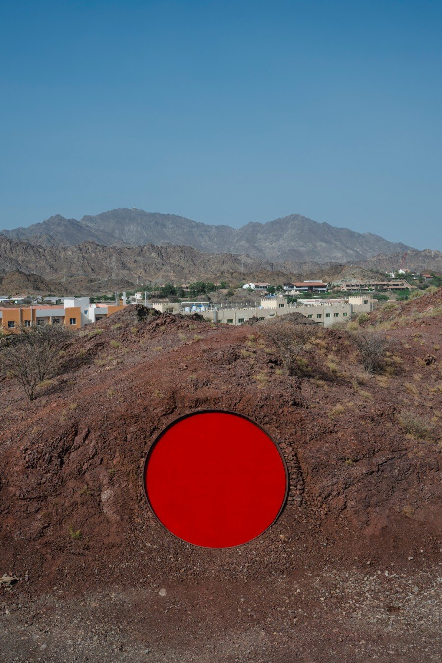 five metallic discs carve shaikha al mazrou's contemplative sculpture trail in UAE mountains