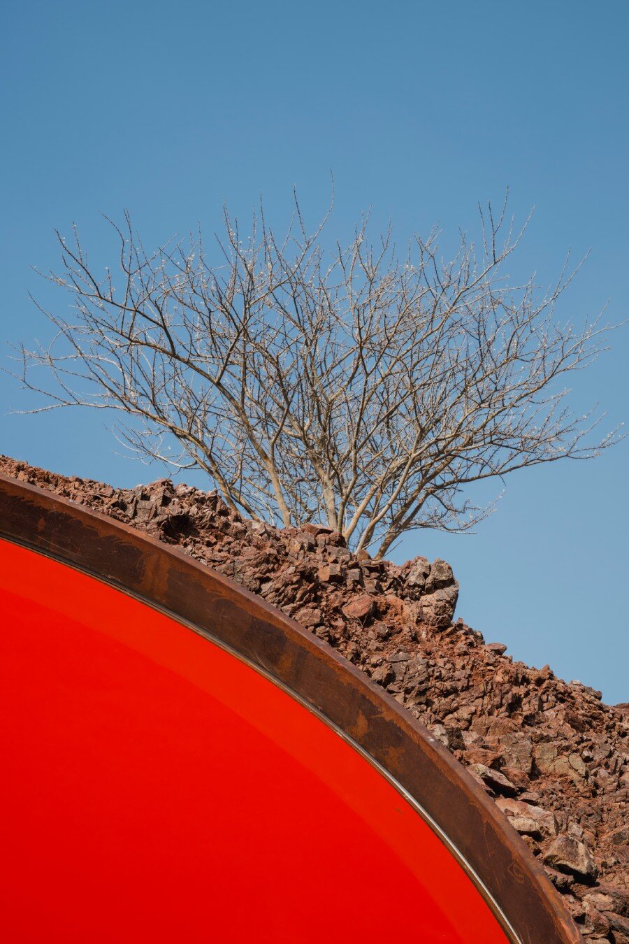 five metallic discs carve shaikha al mazrou's contemplative sculpture trail in UAE mountains