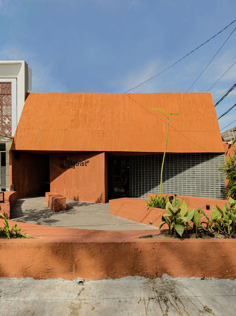Concrete coffee shop with terracotta shades 27 coffee reuses the old medical laboratory in Indonesia