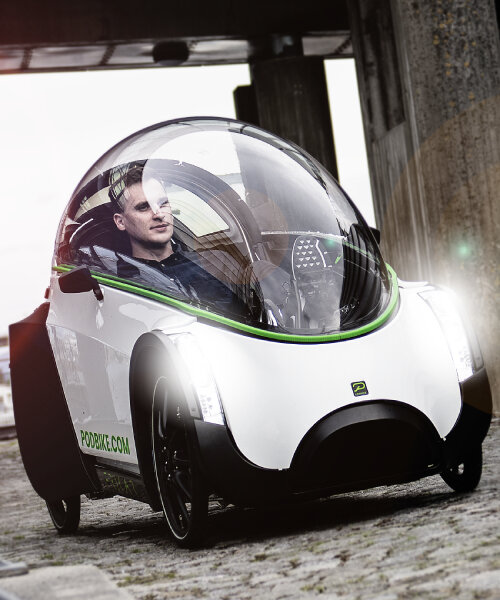 electric podbike frikar encloses riders with dome windshield to protect them in cold weather