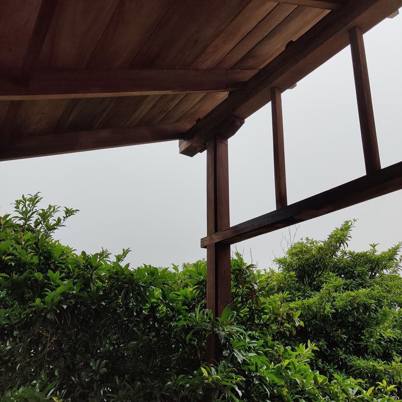 metis practice combines wooden shingles and copper for pali farmhouse's roofing in india