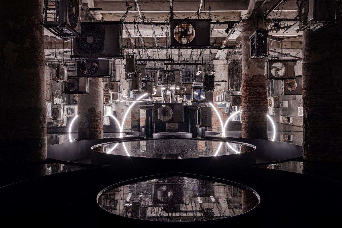 suspended air conditioners and water pools confront global energy impacts at venice architecture biennale