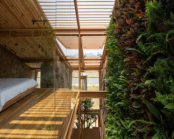85 design’s g.ao house and workspace responds to vietnam’s tropical climate