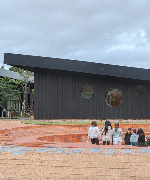 rosan bosch designs nature-integrated garzón school in a eucalyptus forest in uruguay