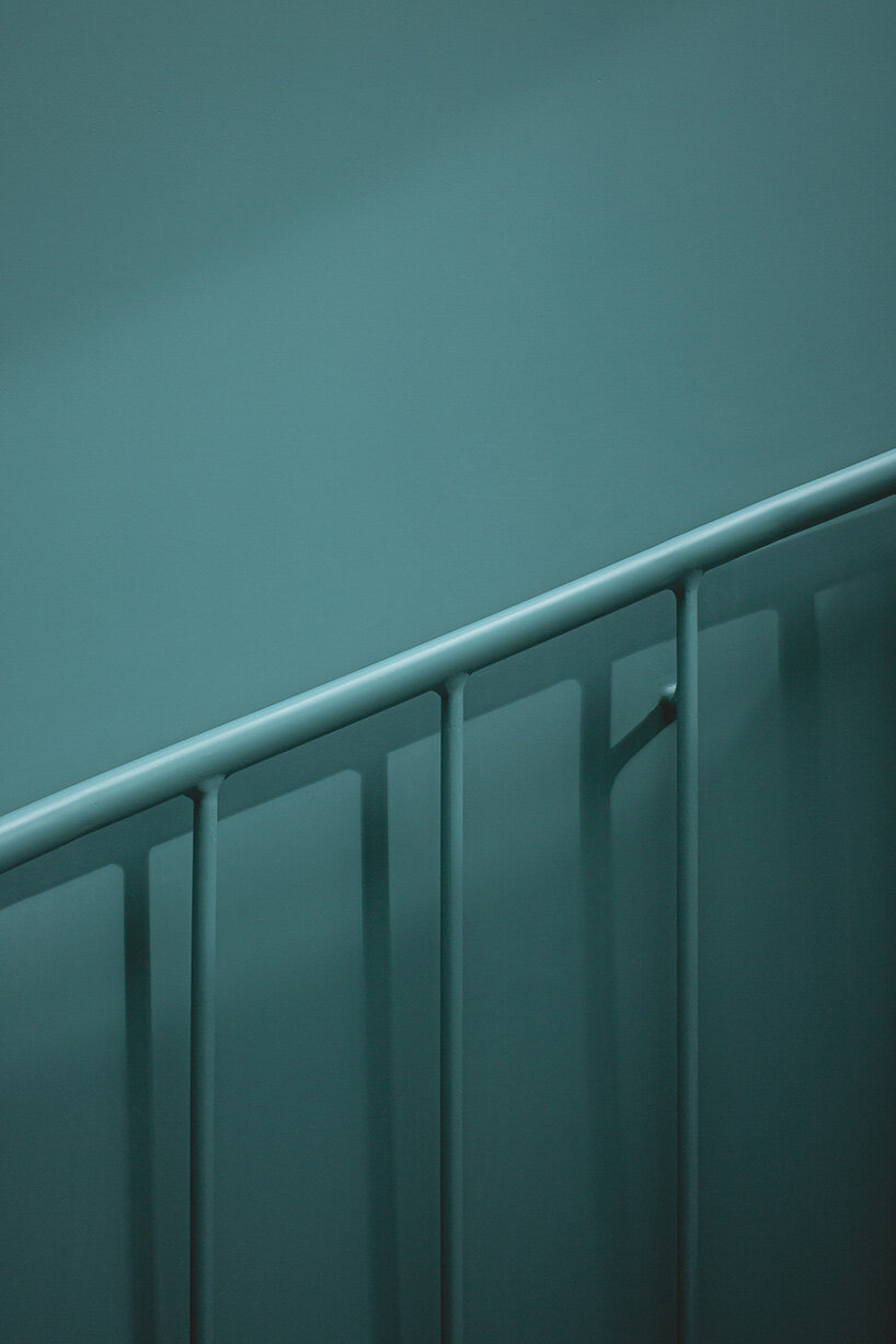 green metal accents bring color to amasa estudio's 1940s home renovation in mexico city