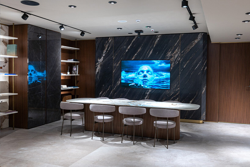 iris ceramica group and alchimia hide audio and video systems within ceramic surfaces