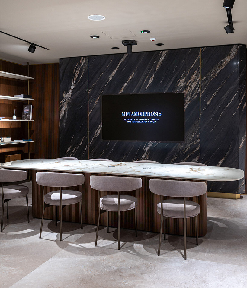 iris ceramica group and alchimia hide audio and video systems within ceramic surfaces