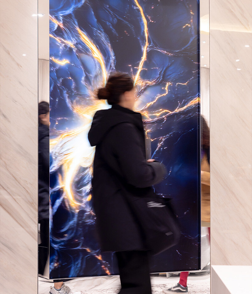 iris ceramica group and alchimia hide audio and video systems within ceramic surfaces