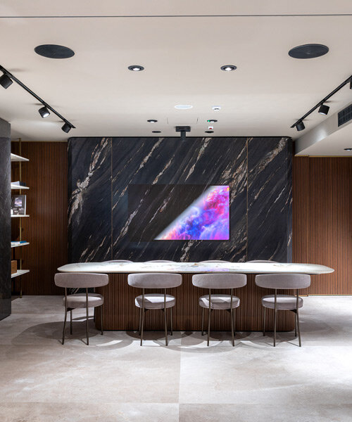 iris ceramica group and alchimia hide audio and video systems within ceramic surfaces