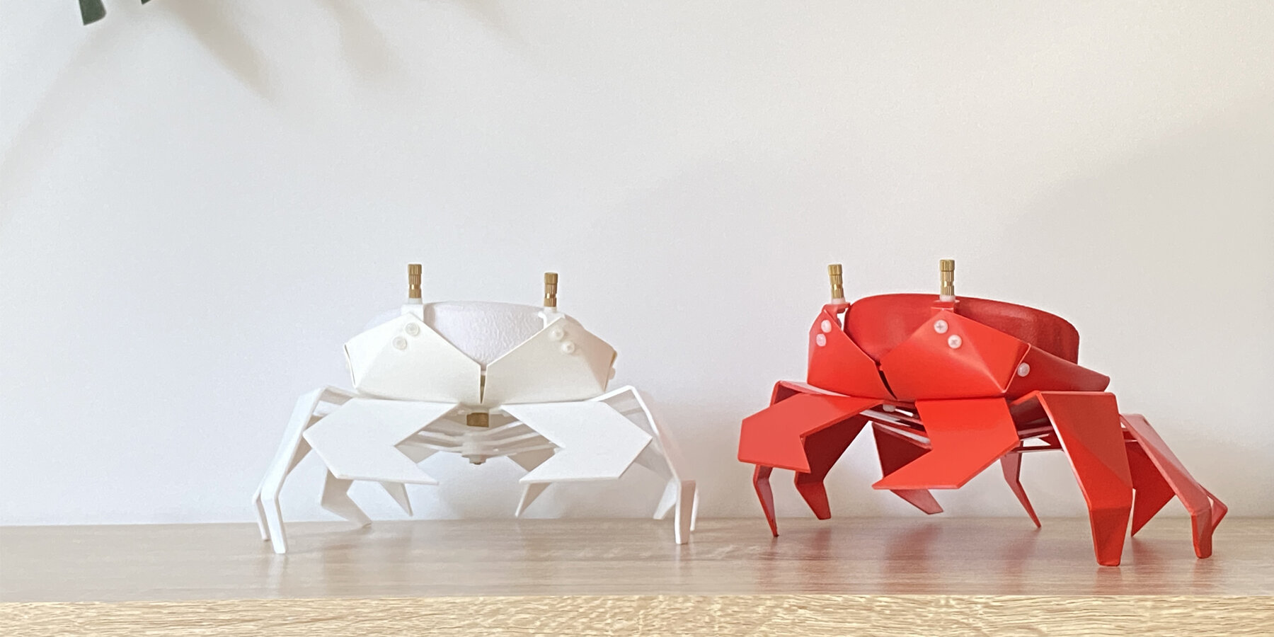 kogani-origami-style-crab-compact-speaker-holder-metal-goat-studio-designboom-1800-3
