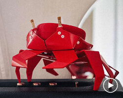 meet kogani, a little origami-style crab that encases compact speakers