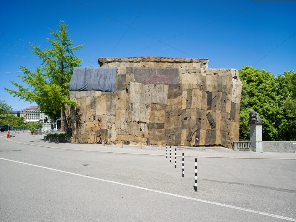 ibrahim mahama wraps kunsthalle bern in jute sack veil, confronting histories of labor & trade