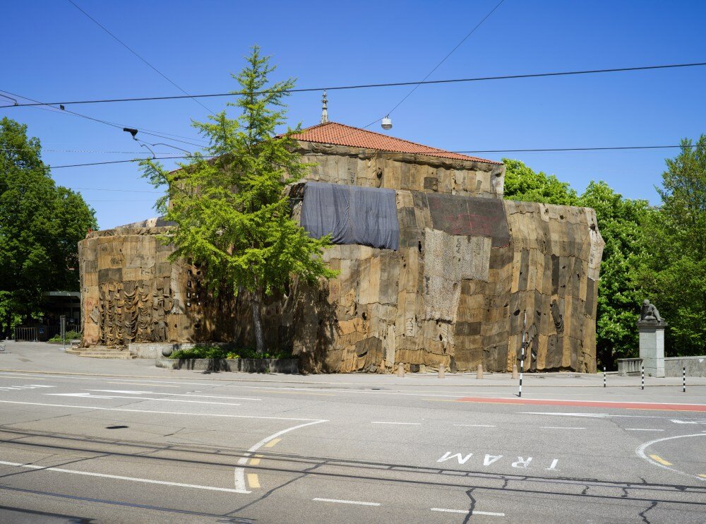 ibrahim mahama wraps kunsthalle bern in jute sack veil, confronting histories of labor & trade