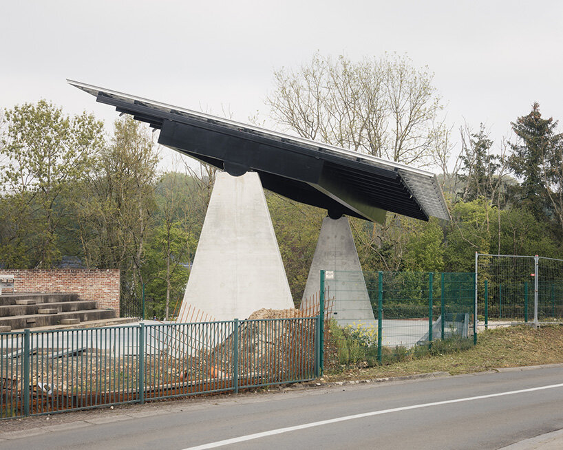 label crowns elevated walkway with telescope-like dome in belgian sports center renovation