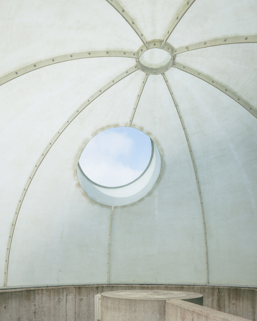 label crowns elevated walkway with telescope-like dome in belgian sports center renovation