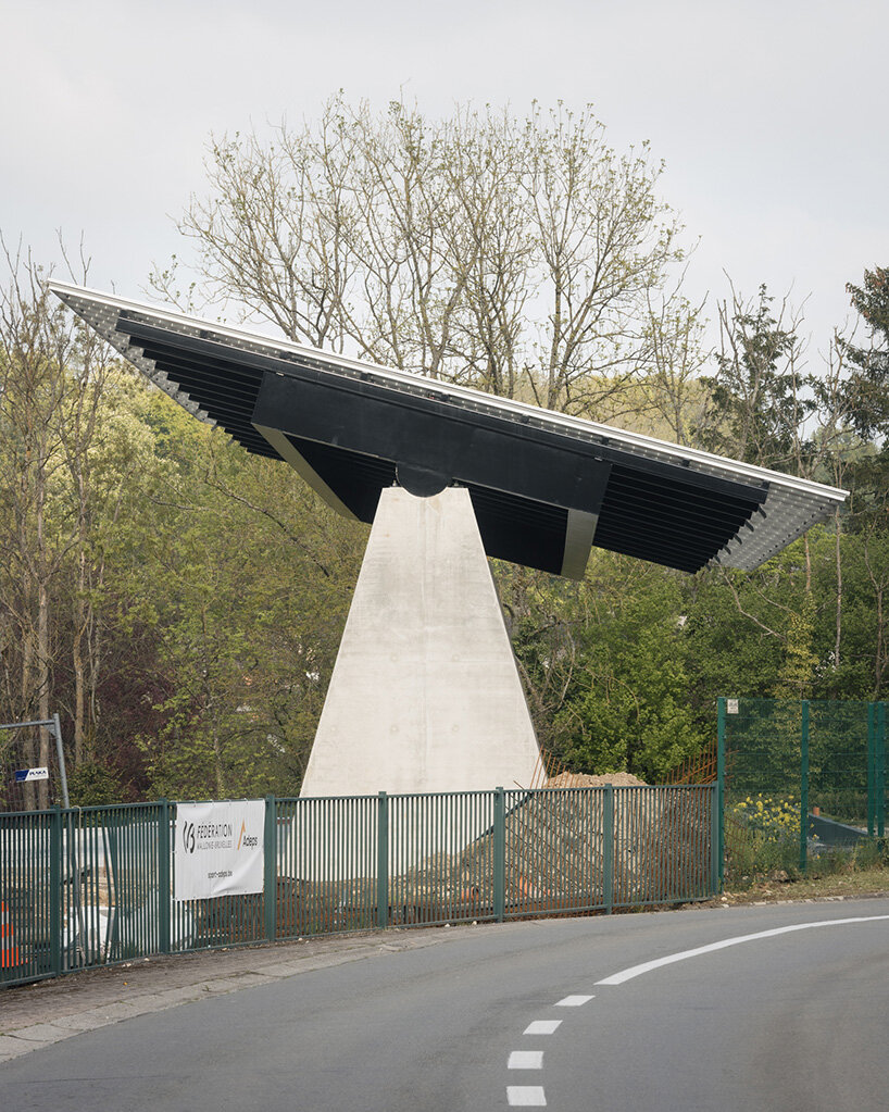 label crowns elevated walkway with telescope-like dome in belgian sports center renovation