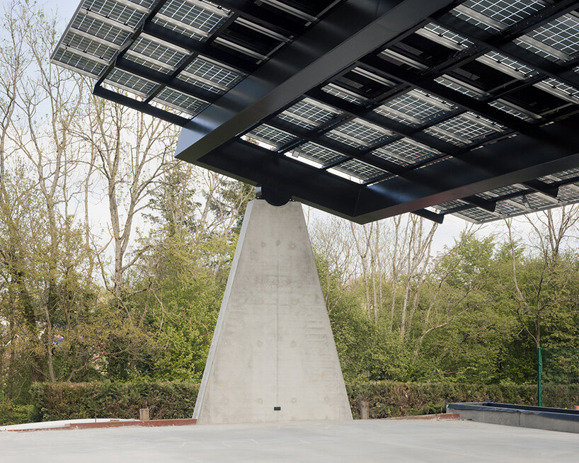 label crowns elevated walkway with telescope-like dome in belgian sports center renovation